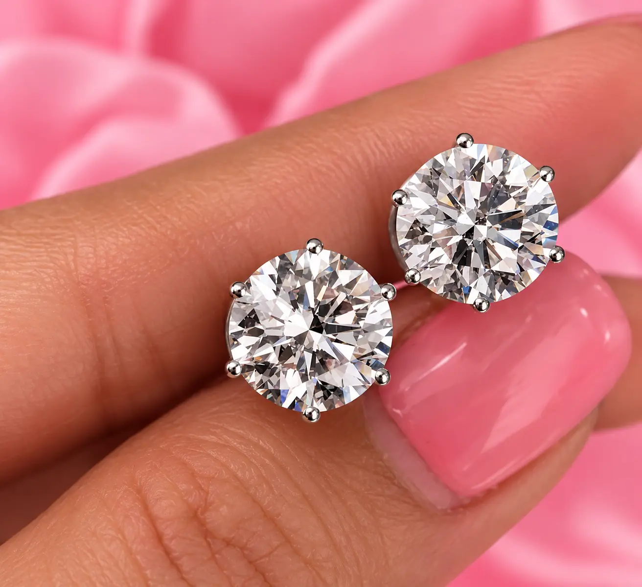 Pear-shaped diamond ring with a diamond halo